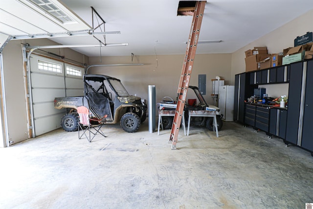 1300 Rocky Rd, Fancy Farm, KY 42039 - garage featuring electric panel and freestanding refrigerator
