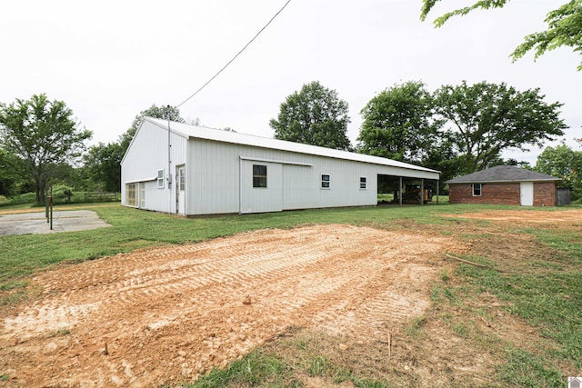 1300 Rocky Rd, Fancy Farm, KY 42039 - view of pole building with a yard
