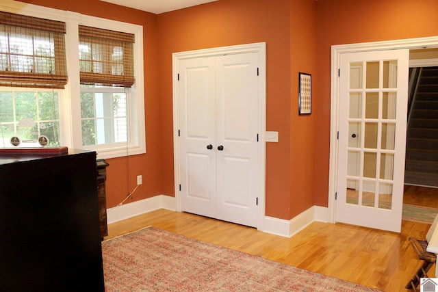 494 Beat Farmer Rd, New Concord, KY 42076 - entryway with wood finished floors, baseboards, and stairs