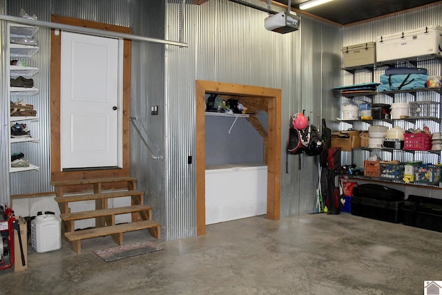 494 Beat Farmer Rd, New Concord, KY 42076 - garage featuring a garage door opener