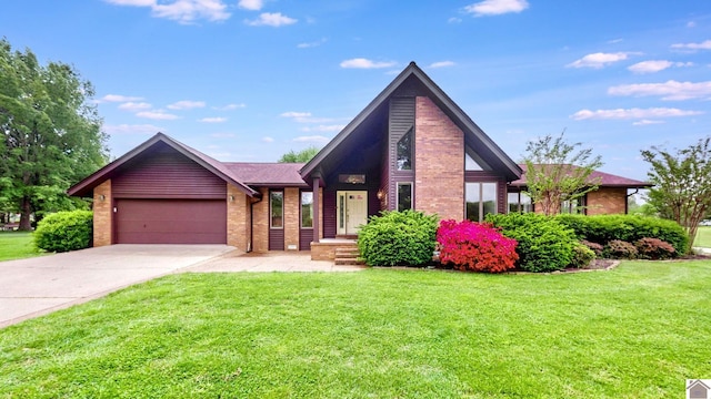 mid-century modern home with brick siding, an attached garage, driveway, and a front lawn