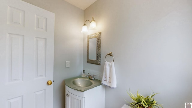 half bath featuring vanity