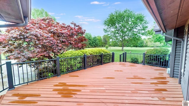 wooden terrace with view of scattered trees