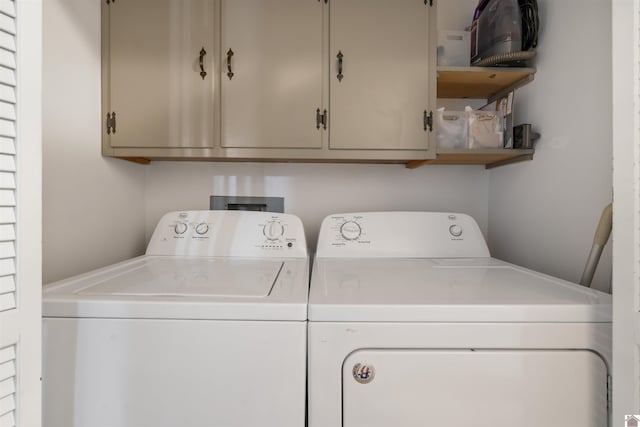 521 Whitnell Ave, Murray, KY 42071 - laundry room featuring washer and clothes dryer and cabinet space