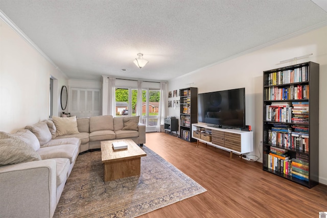 521 Whitnell Ave, Murray, KY 42071 - living room with ornamental molding, a textured ceiling, and wood finished floors