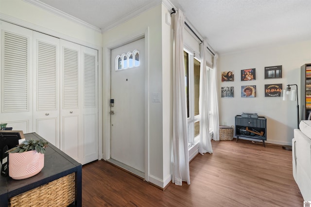 521 Whitnell Ave, Murray, KY 42071 - entrance foyer with ornamental molding, wood finished floors, and baseboards