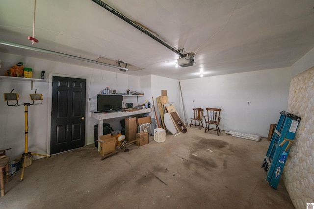 garage featuring a garage door opener