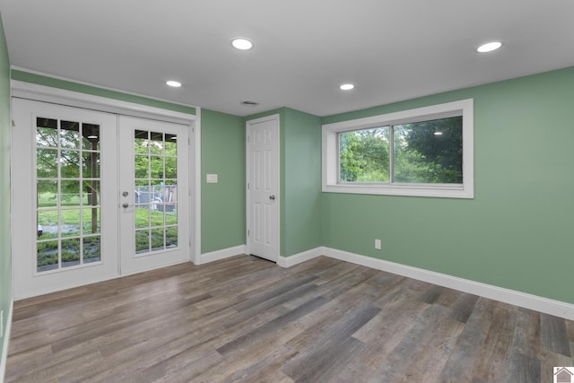 890 Ridge Rd, Gilbertsville, KY 42044 - empty room featuring baseboards, french doors, wood finished floors, and recessed lighting