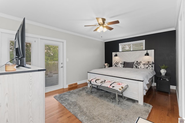890 Ridge Rd, Gilbertsville, KY 42044 - bedroom with access to outside, ornamental molding, wood finished floors, baseboards, and ceiling fan
