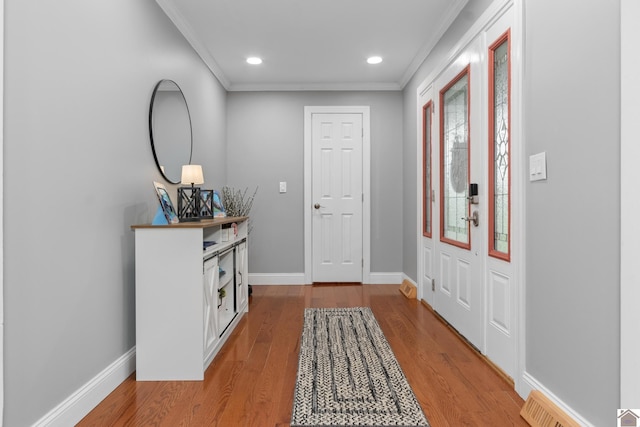 890 Ridge Rd, Gilbertsville, KY 42044 - entryway featuring crown molding, baseboards, wood finished floors, and recessed lighting