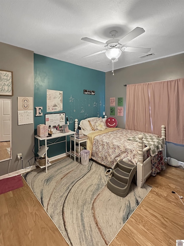 478 Lovers Ln, Benton, KY 42025 - bedroom with wood finished floors and ceiling fan