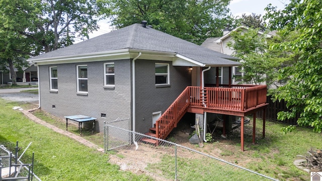 509 S 6th St, Murray, KY 42071 - back of property with crawl space, a gate, a wooden deck, brick siding, and a shingled roof