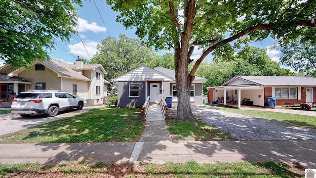 509 S 6th St, Murray, KY 42071 - bungalow featuring driveway and a front lawn