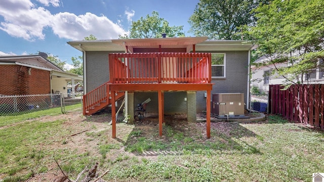 509 S 6th St, Murray, KY 42071 - rear view of house with brick siding, central AC unit, a wooden deck, and stairs