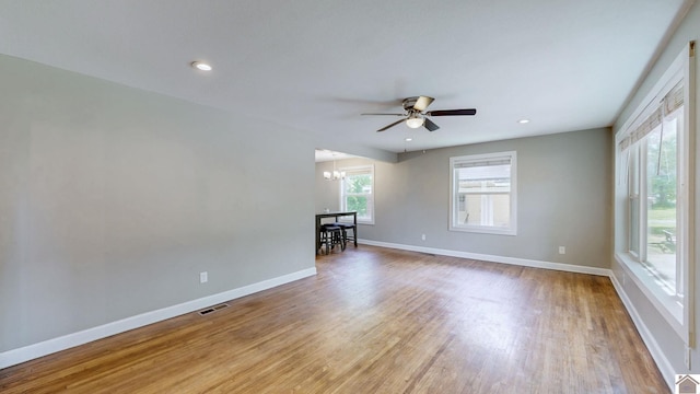 509 S 6th St, Murray, KY 42071 - unfurnished room featuring a chandelier, a ceiling fan, baseboards, light wood-style flooring, and recessed lighting