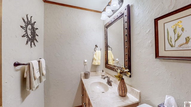 111 Honeysuckle Ln, Murray, KY 42071 - bathroom with vanity, a textured wall, and crown molding