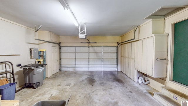 111 Honeysuckle Ln, Murray, KY 42071 - garage featuring a garage door opener