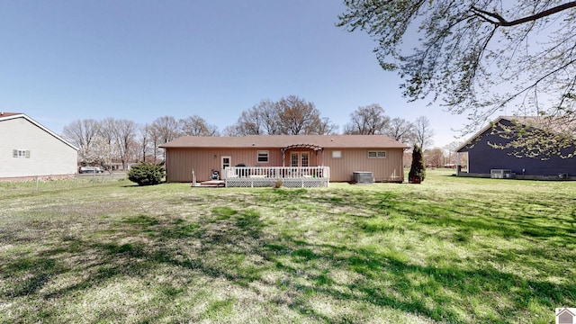 111 Honeysuckle Ln, Murray, KY 42071 - rear view of property featuring a deck, a lawn, and central air condition unit