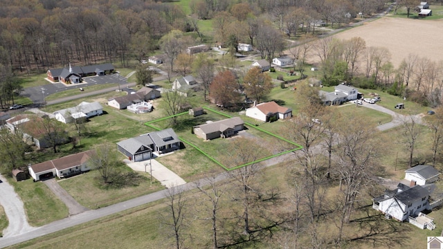 111 Honeysuckle Ln, Murray, KY 42071 - aerial view of property and surrounding area featuring nearby suburban area and a heavily wooded area