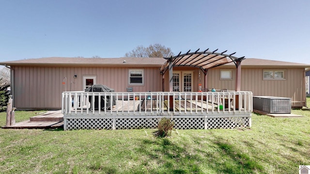 111 Honeysuckle Ln, Murray, KY 42071 - back of house with a pergola, a deck, a yard, and central AC