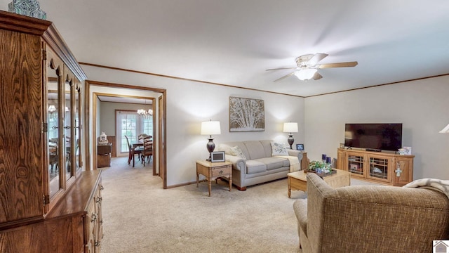 111 Honeysuckle Ln, Murray, KY 42071 - living room featuring light carpet, a chandelier, crown molding, a ceiling fan, and baseboards