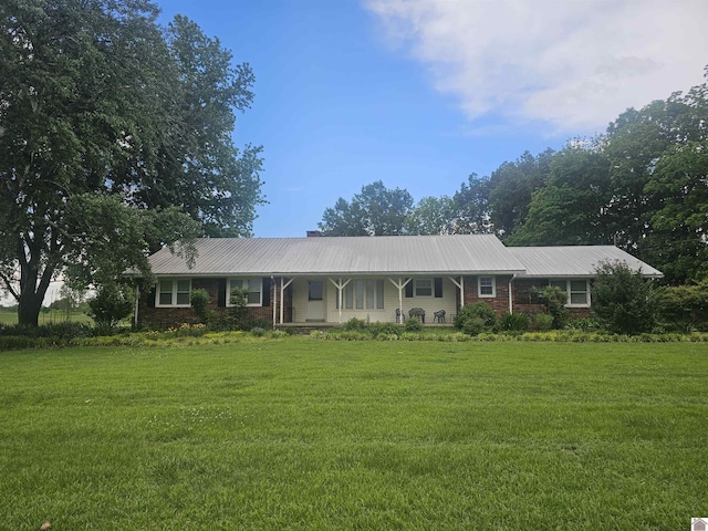 5182 State Route 58 E, Clinton, KY 42031 - ranch-style home featuring a front lawn, metal roof, and covered porch