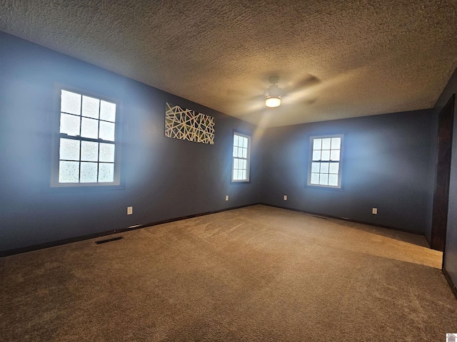 5182 State Route 58 E, Clinton, KY 42031 - carpeted spare room featuring baseboards and a textured ceiling