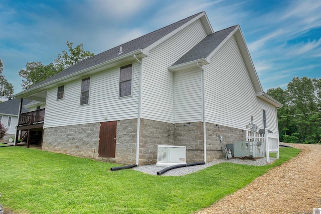 5904 Moors Camp Hwy, Gilbertsville, KY 42044 - view of side of home with a lawn, roof with shingles, and central AC unit