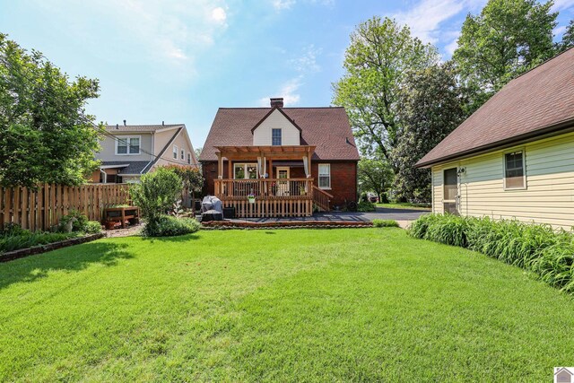 1931 Jefferson St, Paducah, KY 42001 - rear view of house with a deck, a pergola, and a chimney