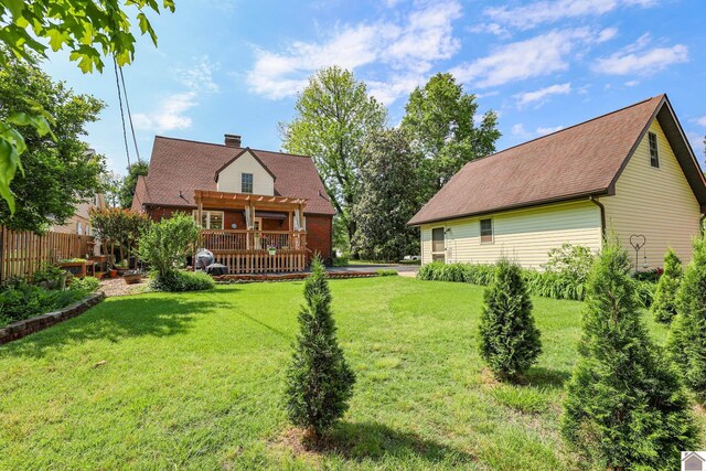 1931 Jefferson St, Paducah, KY 42001 - view of yard with a pergola and a wooden deck