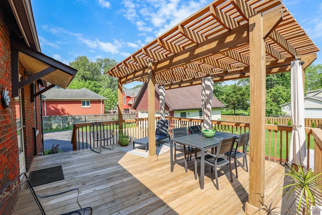 1931 Jefferson St, Paducah, KY 42001 - wooden deck featuring outdoor dining space, a fenced backyard, and a pergola