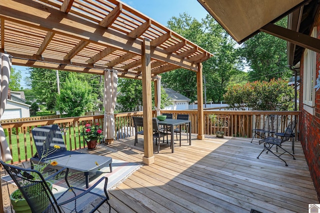 1931 Jefferson St, Paducah, KY 42001 - deck with outdoor dining area, a pergola, and fence