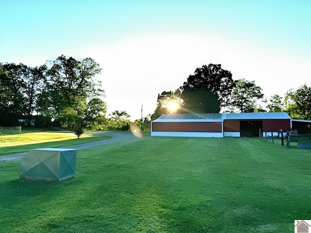 7262 State Route 94 E, Murray, KY 42071 - view of green lawn with an outbuilding and an outdoor structure