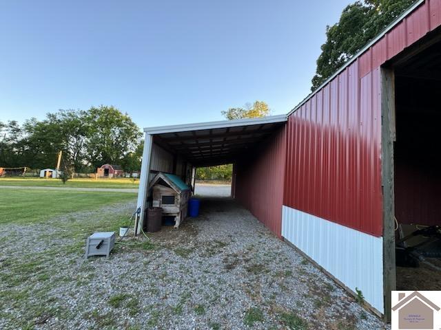 7262 State Route 94 E, Murray, KY 42071 - view of parking / parking lot featuring a pole building