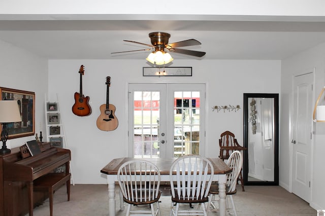 7262 State Route 94 E, Murray, KY 42071 - dining room with light colored carpet, french doors, and a ceiling fan