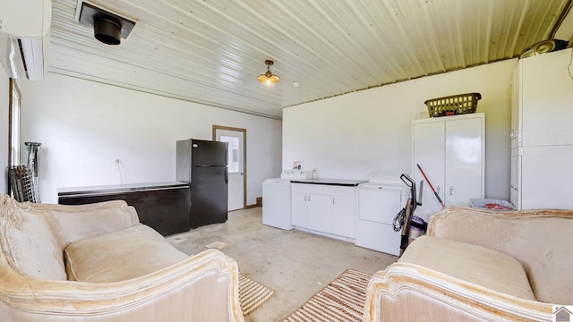 711 Rocky Rd, Fancy Farm, KY 42039 - living area with washer / clothes dryer and concrete flooring