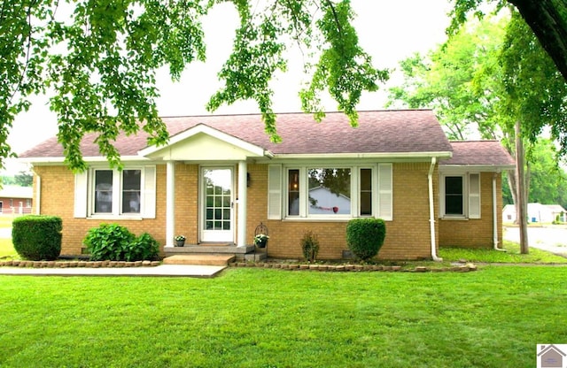 3500 Cairo, Paducah, KY 42001 - single story home featuring a front yard, brick siding, and a shingled roof
