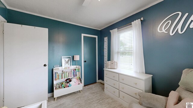 3500 Cairo, Paducah, KY 42001 - sitting room with crown molding, a ceiling fan, baseboards, and light wood-style floors