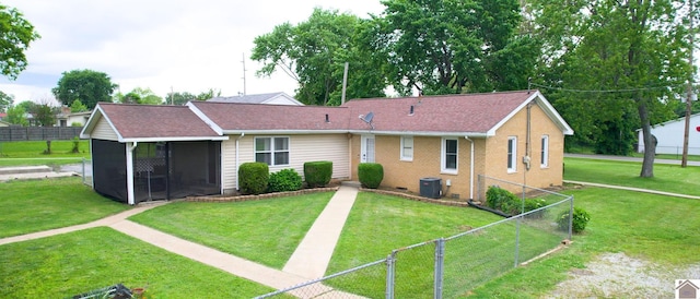 3500 Cairo, Paducah, KY 42001 - back of house with central AC unit, a sunroom, and brick siding