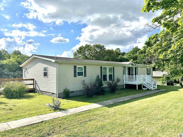 5109 S Rd, Cadiz, KY 42211 - manufactured / mobile home featuring crawl space, a front yard, and a deck