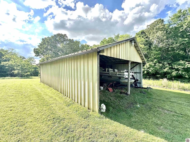 5109 S Rd, Cadiz, KY 42211 - view of pole building featuring a yard and a detached carport