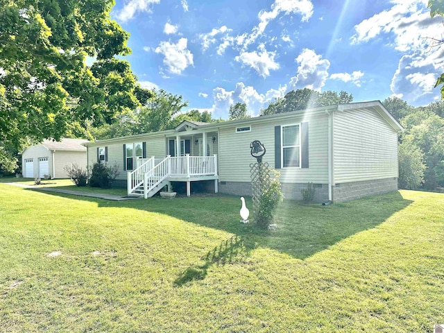 5109 S Rd, Cadiz, KY 42211 - view of front of home with crawl space, a front lawn, and a detached garage