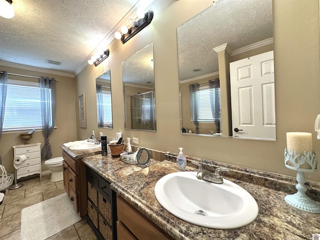 5109 S Rd, Cadiz, KY 42211 - bathroom with a textured ceiling, a stall shower, toilet, double vanity, and ornamental molding