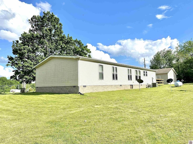 5109 S Rd, Cadiz, KY 42211 - view of property exterior with a lawn, crawl space, and cooling unit