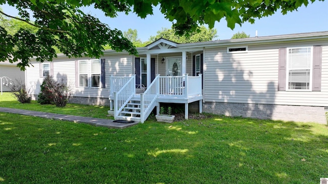 5109 S Rd, Cadiz, KY 42211 - view of front facade featuring crawl space, a front lawn, and covered porch