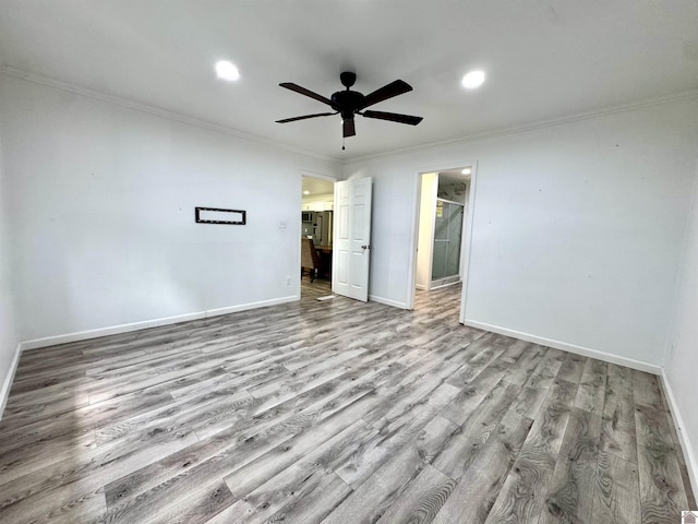 566 Golden Meadow Ln, Ledbetter, KY 42058 - empty room featuring ornamental molding, wood finished floors, baseboards, ceiling fan, and recessed lighting
