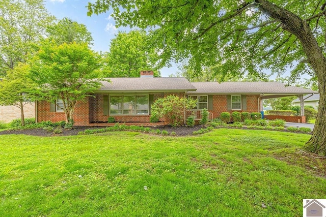 1906 Gatesborough Cir, Murray, KY 42071 - ranch-style house featuring brick siding, an attached carport, a front yard, and a chimney