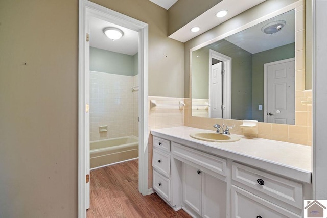 1906 Gatesborough Cir, Murray, KY 42071 - full bath with vanity, wood finished floors, and  shower combination