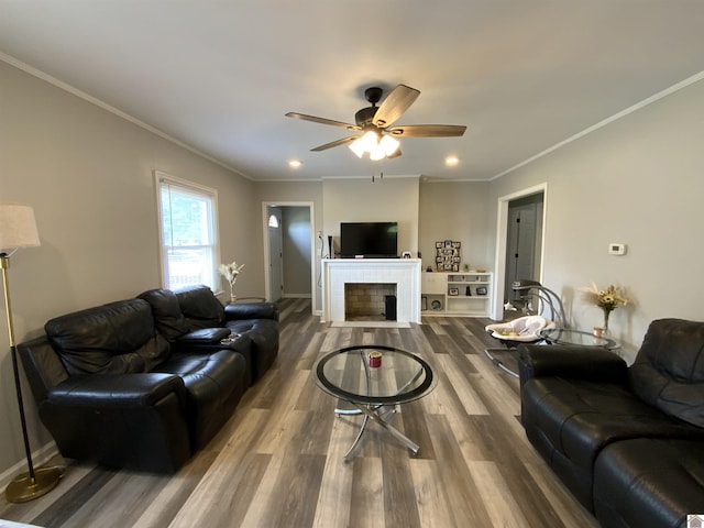 3827 Howle, Paducah, KY 42003 - living room featuring wood finished floors, a ceiling fan, ornamental molding, baseboards, and a tiled fireplace