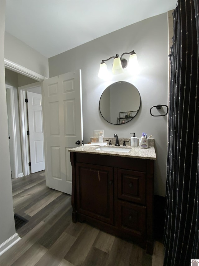 3827 Howle, Paducah, KY 42003 - bathroom with wood finished floors and vanity